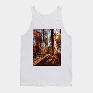 Sun rising behind autumn trees Tank Top